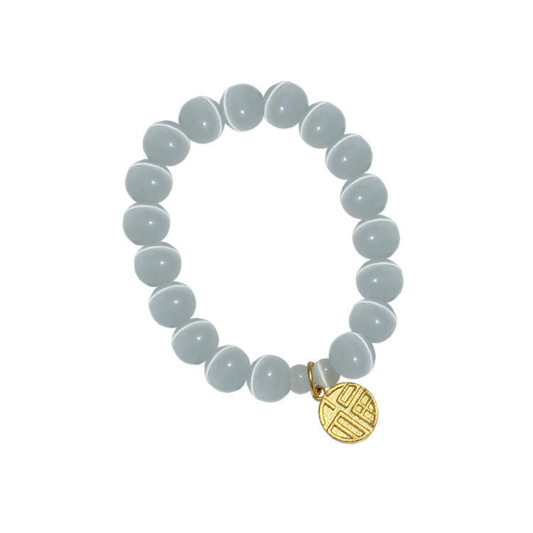 Bracciale da donna placcato in titanio e acciaio, con design floreale minimalista, pietra occhio di gatto e ciondolo portafortuna Fu
