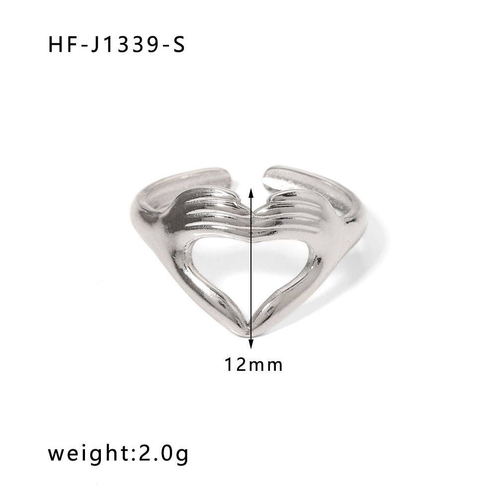 Anello da donna in acciaio inossidabile geometrico a forma di cuore, minimalista, con finitura placcata e design ispirato a una catena