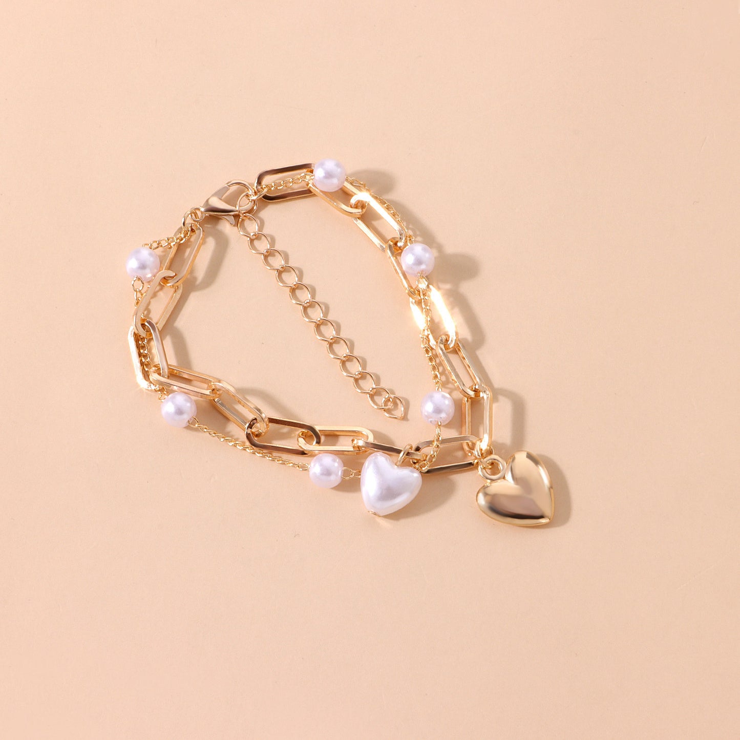 Punk Style Heart-Shaped Alloy Bracelet for Women with Electroplated Finish and Pearl Accent