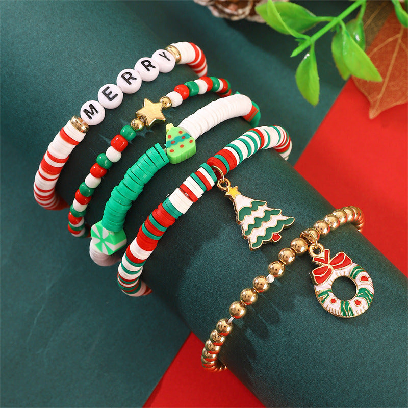 Set di bracciali natalizi fatti a mano in argilla polimerica da donna con ciondoli di Babbo Natale e fiocchi di neve in stile cartone animato giocoso