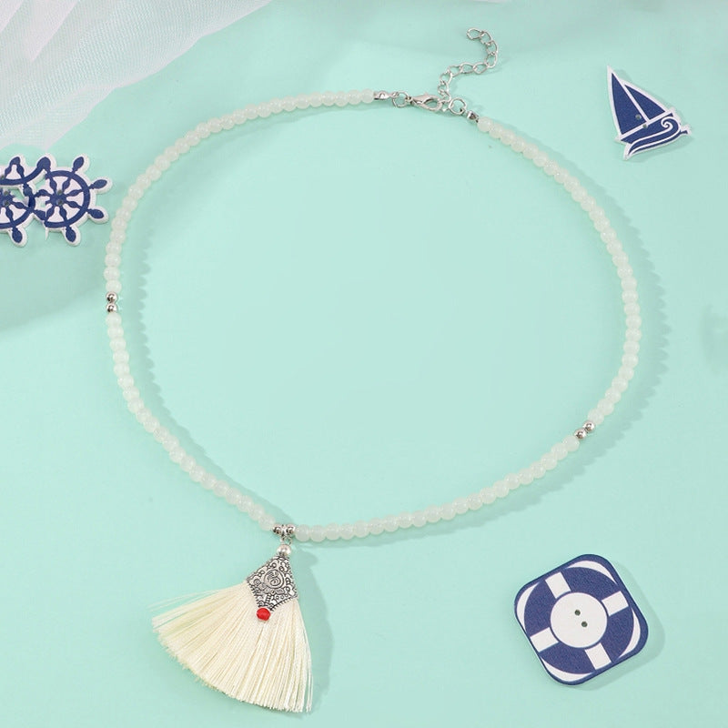 Collana pendente con nappe in stile bohémien per bambini, realizzata in perline di vetro con nappe abbinate su catena di perline rotonde