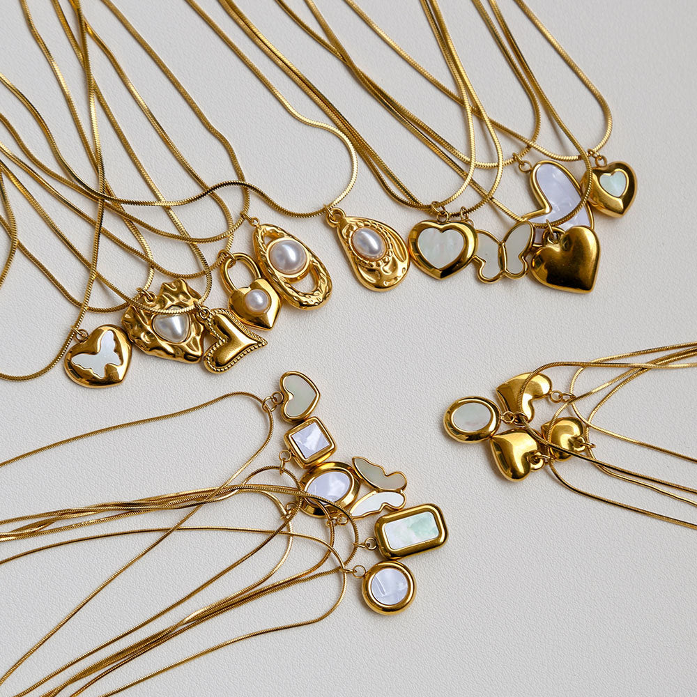 Collar minimalista de acero de titanio con forma de corazón, chapado en oro, perla y cadena ajustable para mujer