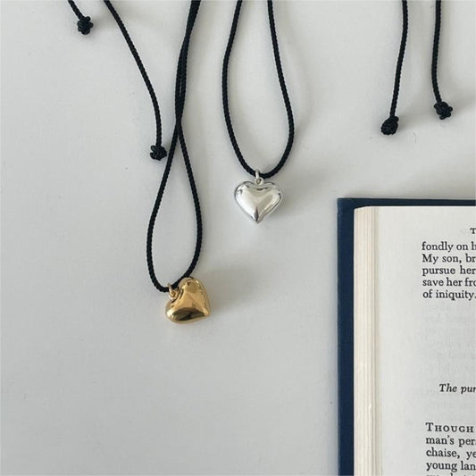 Minimalist Heart-Shaped 925 Sterling Silver Necklace with Gold Plating on Waxed Cotton Cord