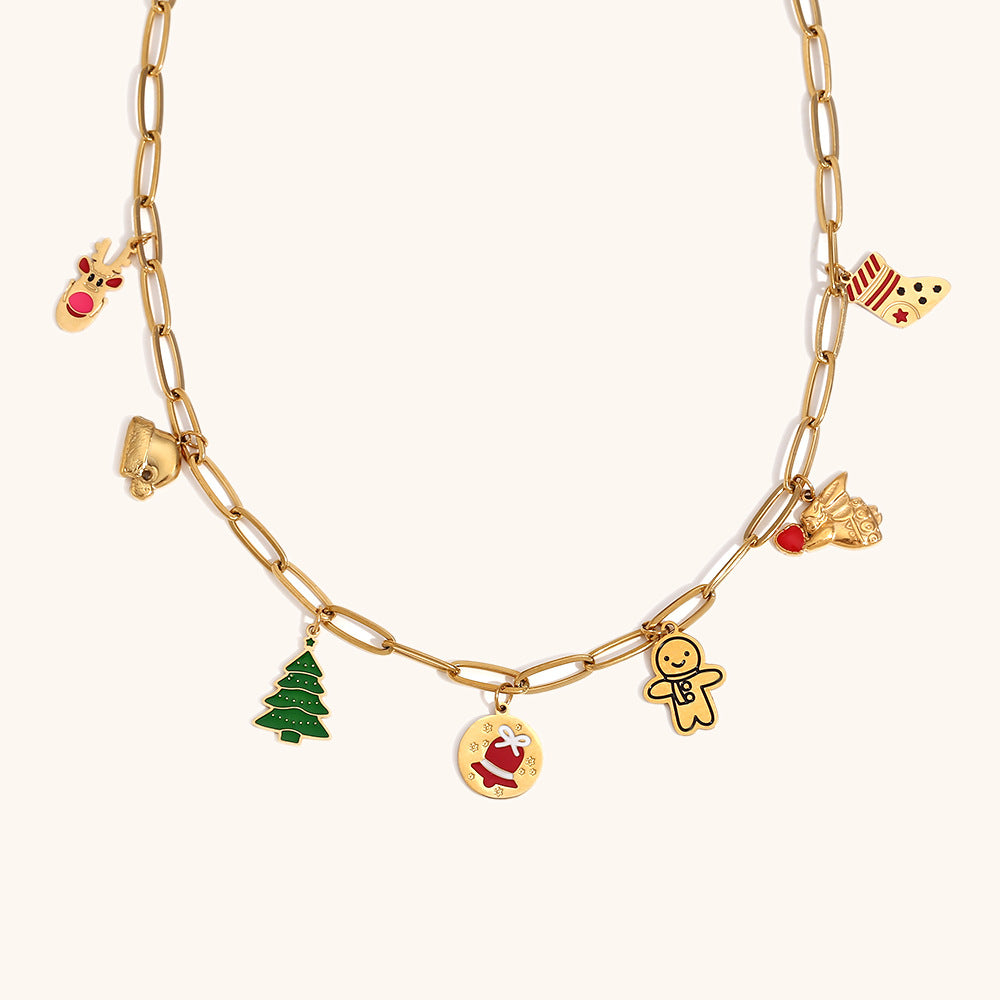 Pulsera minimalista geométrica de acero inoxidable enchapado en oro de 18 quilates con dije de copo de nieve navideño