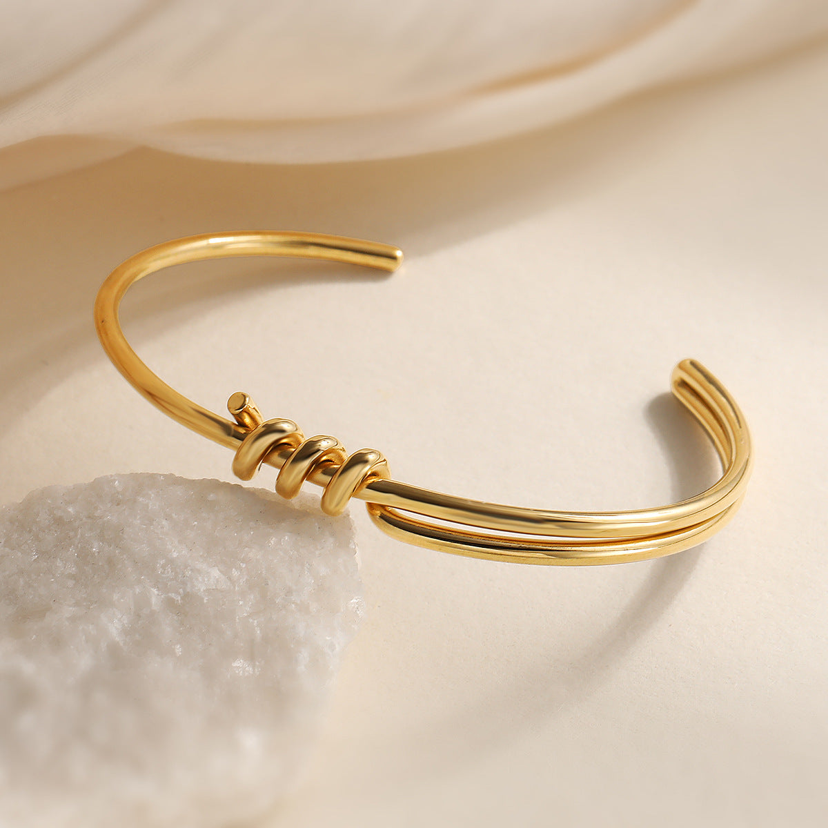 Minimalist C-Shaped Stainless Steel Bracelet for Women with 18K Gold Plating and Asymmetrical Knot Detail