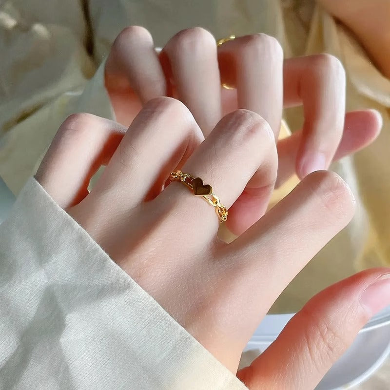 Sweet Minimalist Geometric Hollow Heart-Shaped Titanium Steel Ring with Gold Plating for Women