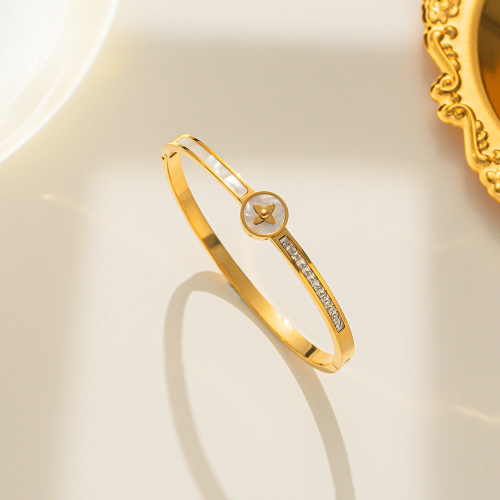 Minimalist Gold-Plated Titanium Steel Bracelet for Women with Rhinestone-Inlaid Shell and Letter Charm
