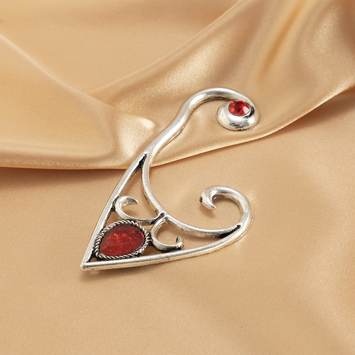 Pendiente de oreja gótico vintage con gema roja y contorno de hada para mujer, con cuerpo metálico de forma geométrica y acabado galvanizado