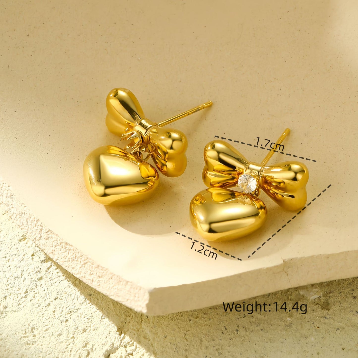 Pendientes elegantes de acero de titanio con lazo para mujer con detalles de pedrería, aretes de acero inoxidable en forma de corazón, minimalistas y versátiles