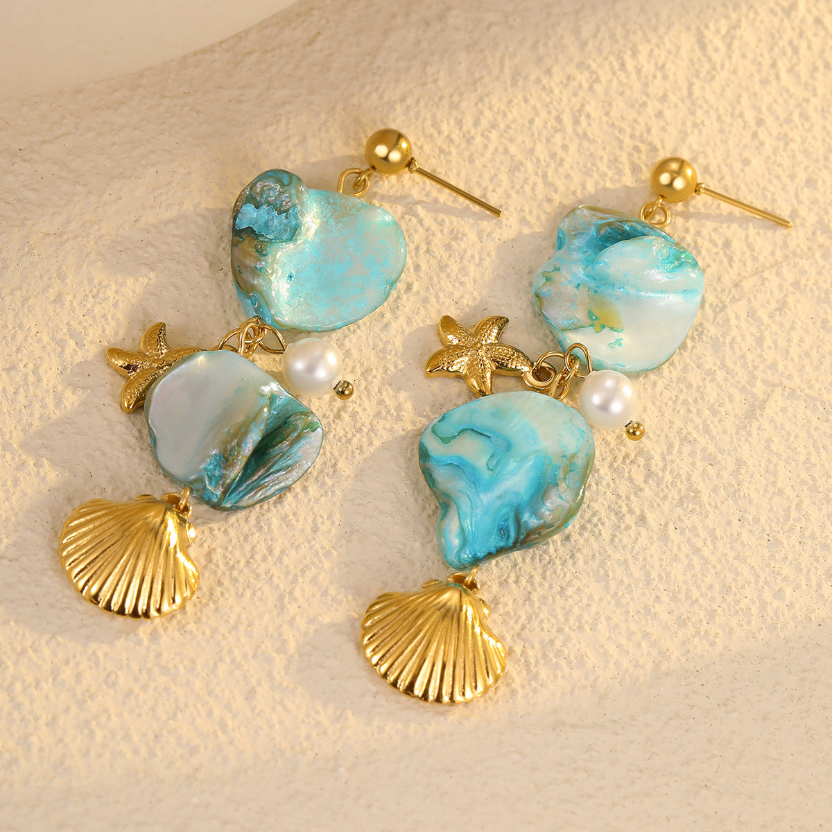 Pendientes de borla de acero inoxidable estilo playa bohemio con detalles de perlas y conchas de estrella de mar