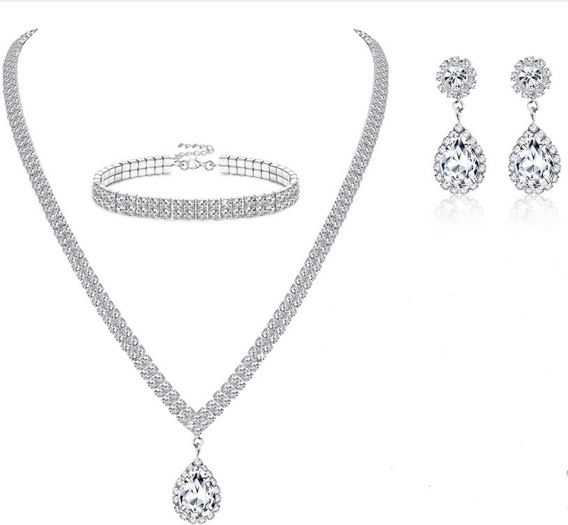 Minimalist Heart Drop Bell Pendant Necklace Set with Rhinestone Accents in Alloy, Includes Matching Earrings and Bracelet
