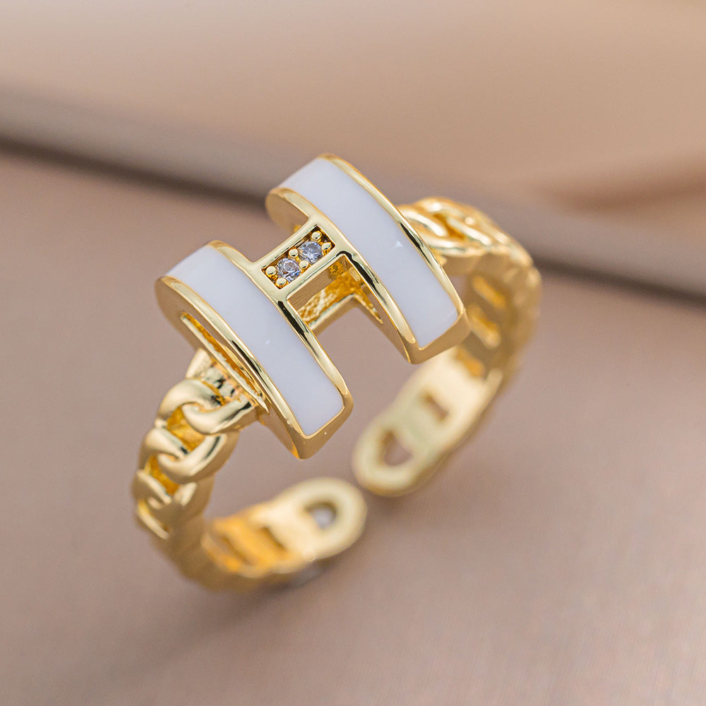 Anello minimalist in acciaio titanio traforato con design geometrico da donna