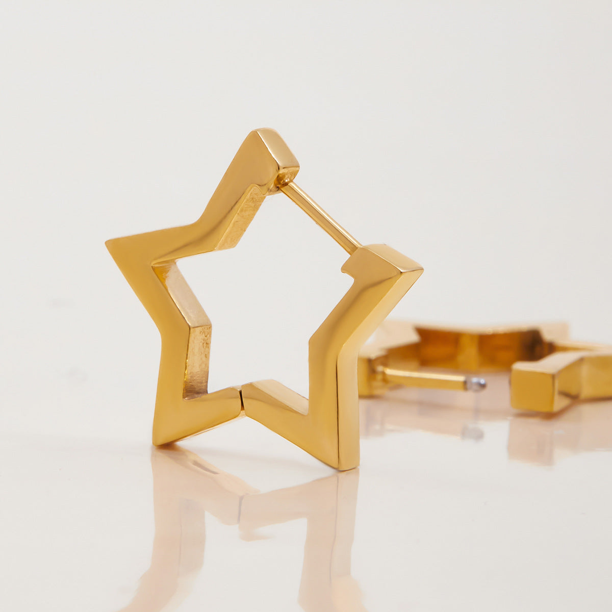 Orecchini a perno a forma di stella minimalisti in acciaio inossidabile placcato da donna