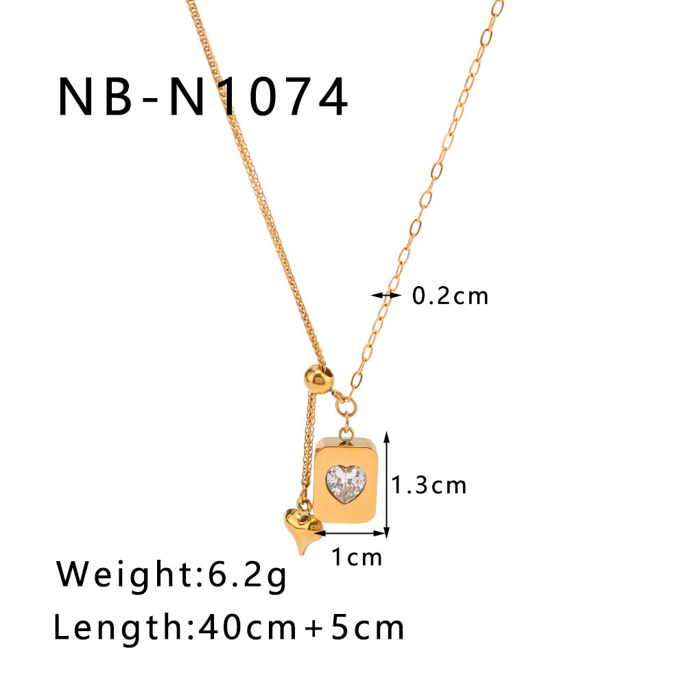Collana con Pendente a Cuore Minimalista in Acciaio al Titanio con Intarsio in Zirconia Cubica e Placcatura in Oro 18K su Catena O per Donna