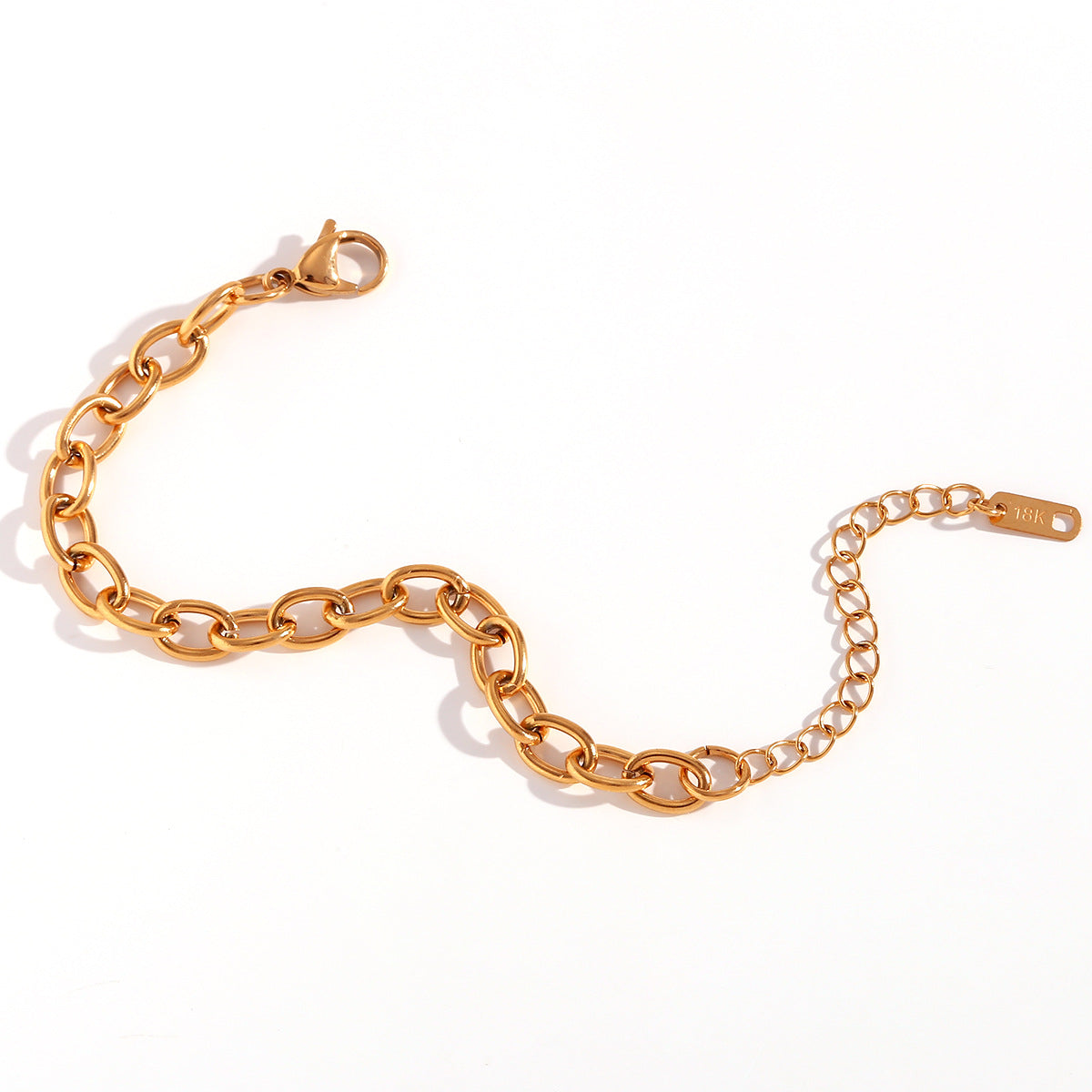 Cavigliera minimalista geometrica in acciaio al titanio placcata oro 18K con catena a scatola da donna