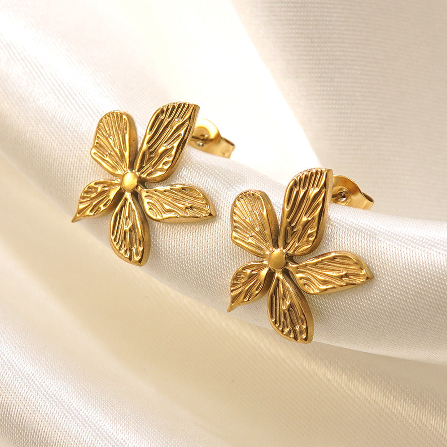 Set di collana e orecchini da donna placcati in acciaio inossidabile con motivo floreale geometrico minimalista