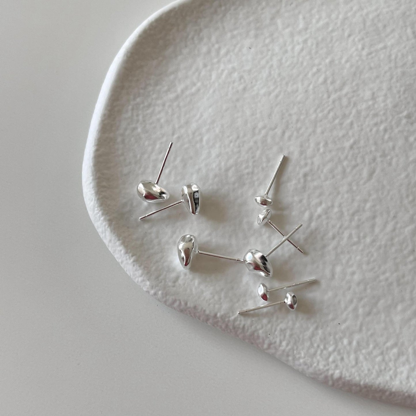 Orecchini a perno minimalisti a forma di stella in argento sterling 925 con pietre cubiche sfaccettate geometriche