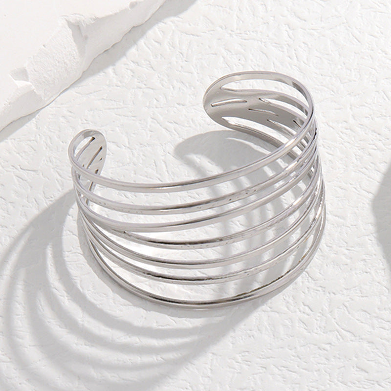 Bracciale in Acciaio al Titanio con Finitura Placcata, Linee Geometriche Minimaliste, da Donna
