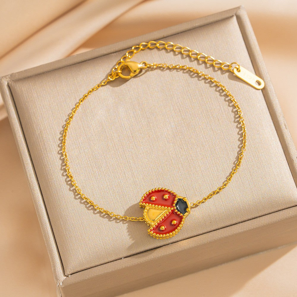 Set di gioielli da donna con fiore a conchiglia a coccinella in acciaio al titanio placcato oro 18 carati e bracciale a catena O con olio smaltato a goccia, minimalista