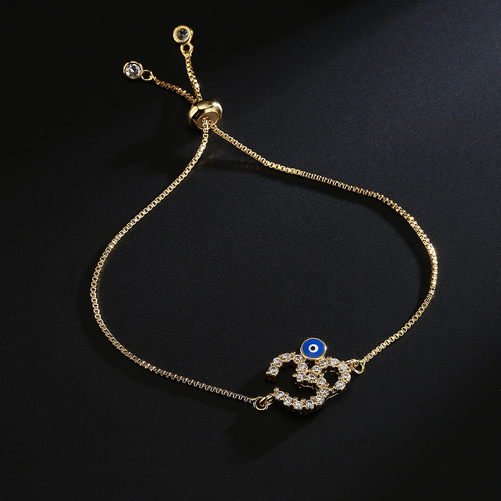 Bracciale da donna regolabile a catena in rame con placcatura in oro 18 carati e zirconi micro-pavé, design geometrico