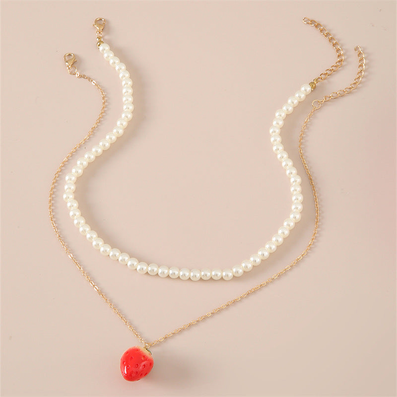 Graziosa collana con ciondolo a fragola per bambine con accenti di perle, set di gioielli per bambini a forma di frutta minimalista