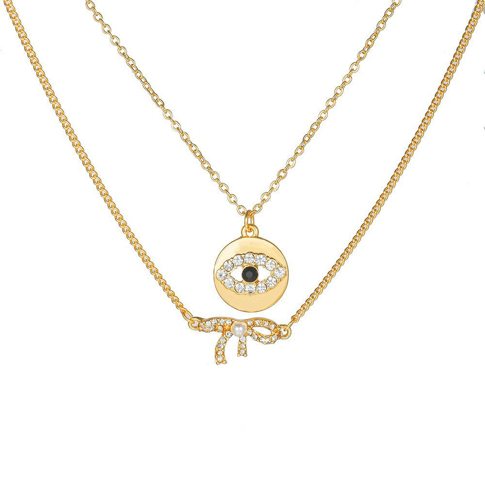 Sweet Rhinestone Inlaid Alloy Butterfly Evil Eye Bow Pendant Necklace with Curb Chain for Women