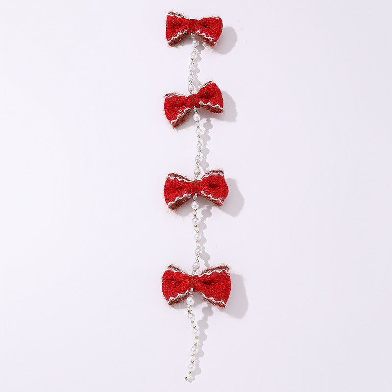 Lindo broche para el cabello en forma de lazo con adorno floral blanco, detalles de perlas y borlas para niñas