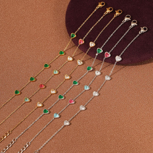 Bracciale da donna in acciaio inossidabile con zirconi a forma di cuore, stile lusso minimalista con finitura placcata