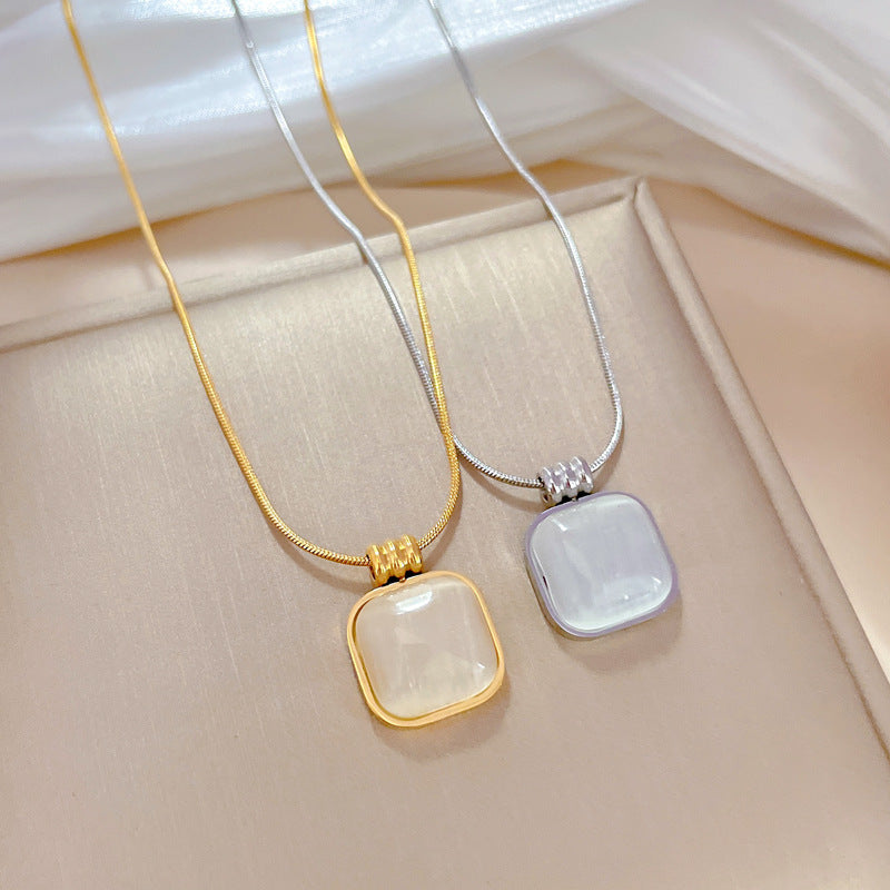 Minimalist Titanium Steel Geometric Cat's Eye Pendant Necklace for Women with Gold Plating and Locket Chain Style