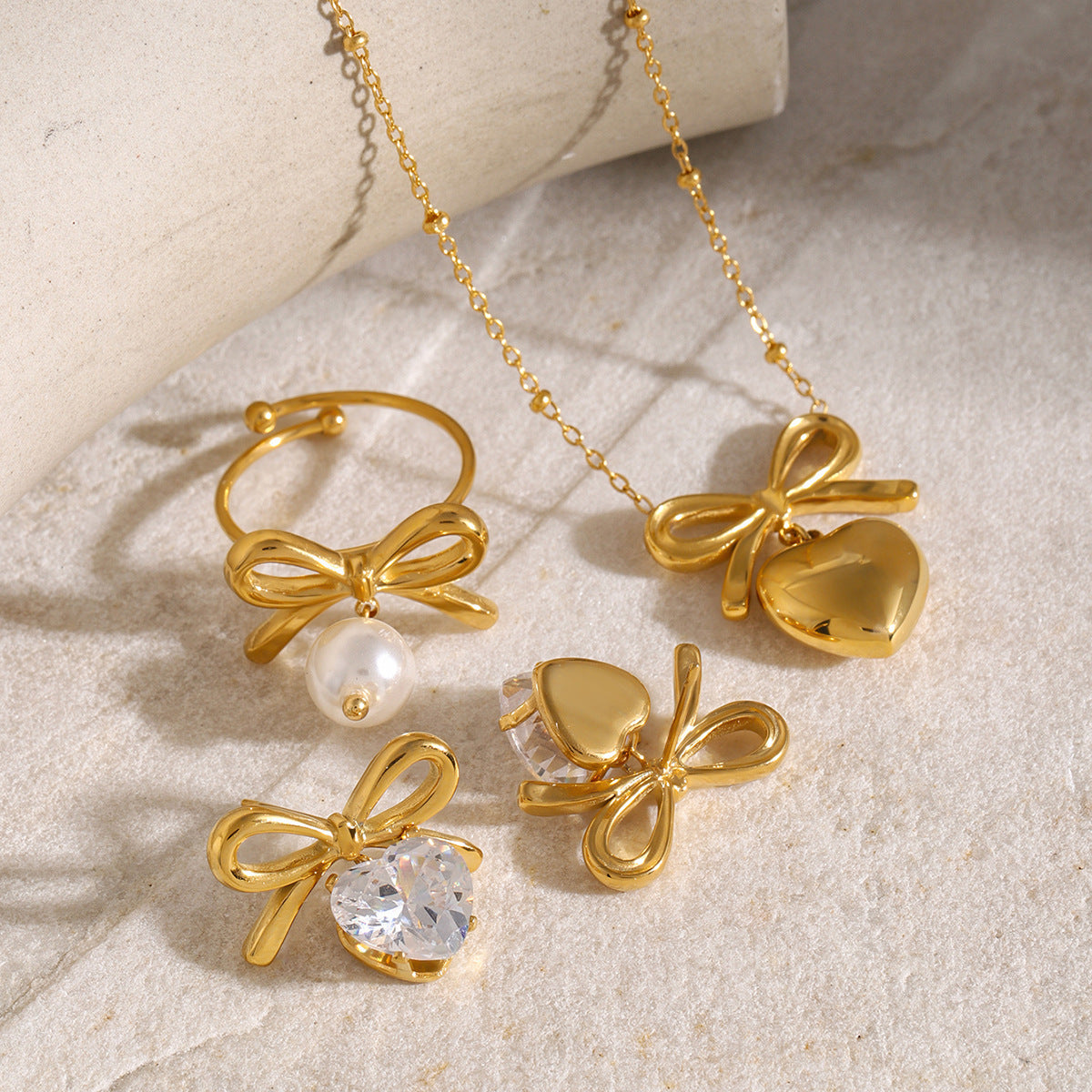 Pendientes de acero inoxidable con nudo de lazo geométrico de moda, chapados en oro de 18 quilates y circonitas