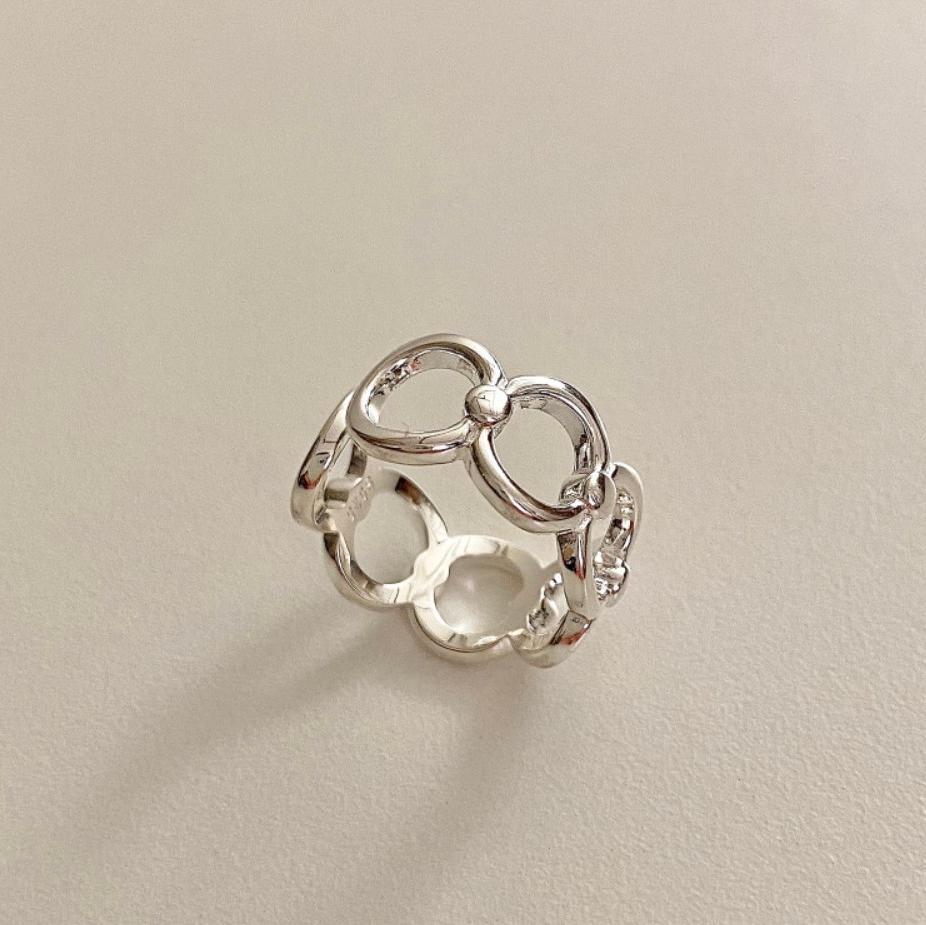 Anillo minimalista de plata de ley 925 con forma de onda para mujer, con diseño circular y acabado incrustado en plata