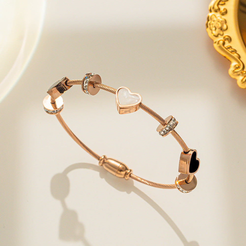 Minimalist Double Heart Titanium Steel Bracelet for Women with Micro-Paved Zirconia and Gold Plating
