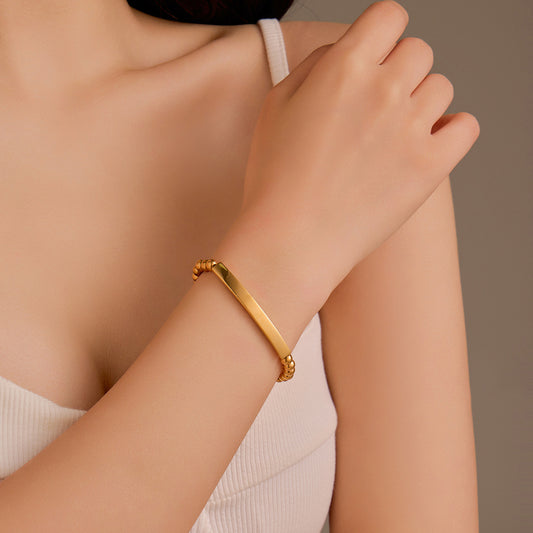 Fashionable Minimalist Stainless Steel Bracelet with 18K Gold-Plated Round Beads and Customizable Titanium Steel Charm for Women