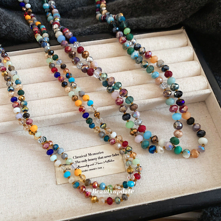 Collana da donna bohémien etnica geometrica con perline e dettagli in cristallo