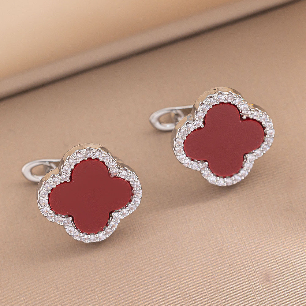 Orecchini a perno Saturno minimalisti color oro in ottone con zirconi per donna
