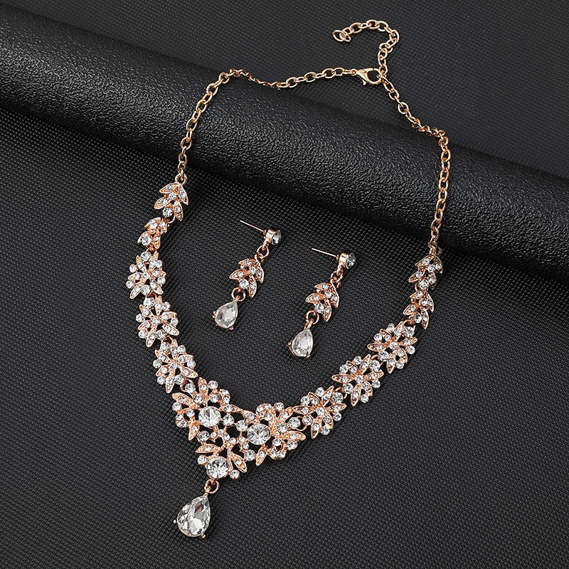 Set di collana e orecchini da sposa con motivo floreale, in lega con ciondolo decorato con strass, catena a serpente, design minimalista a tulipano, margherita e petali di foglie