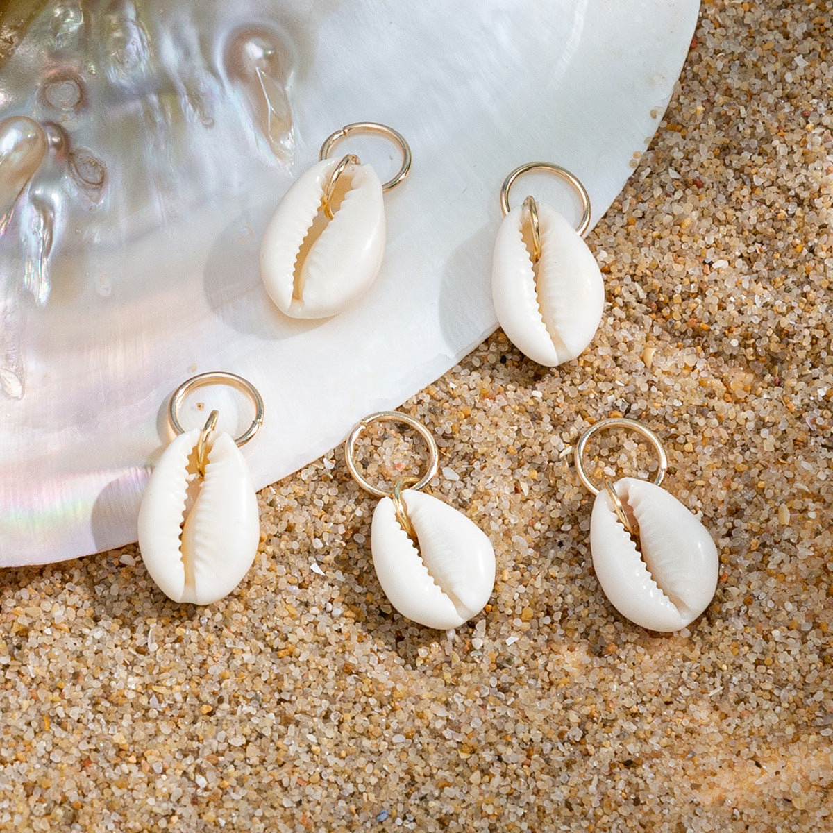 Anillo minimalista geométrico para el cabello inspirado en la playa con colgante de concha y detalles de borlas para mujer