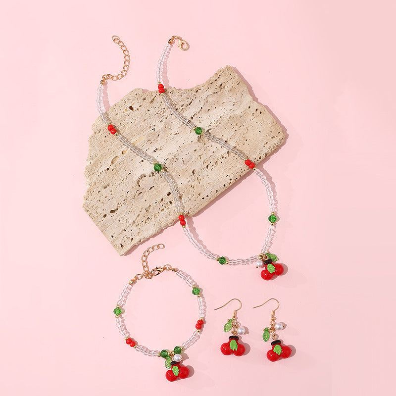 Set di collane con ciondoli a forma di fiocco, ciliegia, uva, frutta e stella marina in resina per bambine con catena di perline