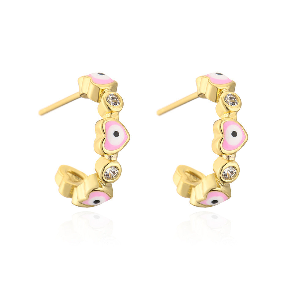 Geometric Style Copper Earrings with 18K Gold Plating and Micro-Paved Zirconia Heart-Eye C-Shaped Design for Women