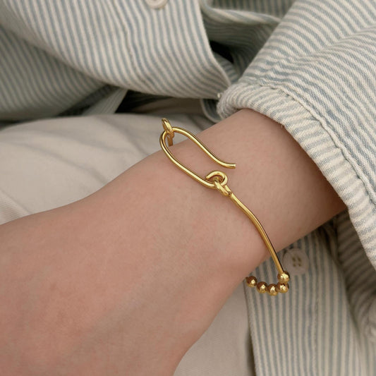 Bracciale con perline geometriche minimaliste in Argento Sterling 925 con dettagli artigianali e nodi ispirati alla natura