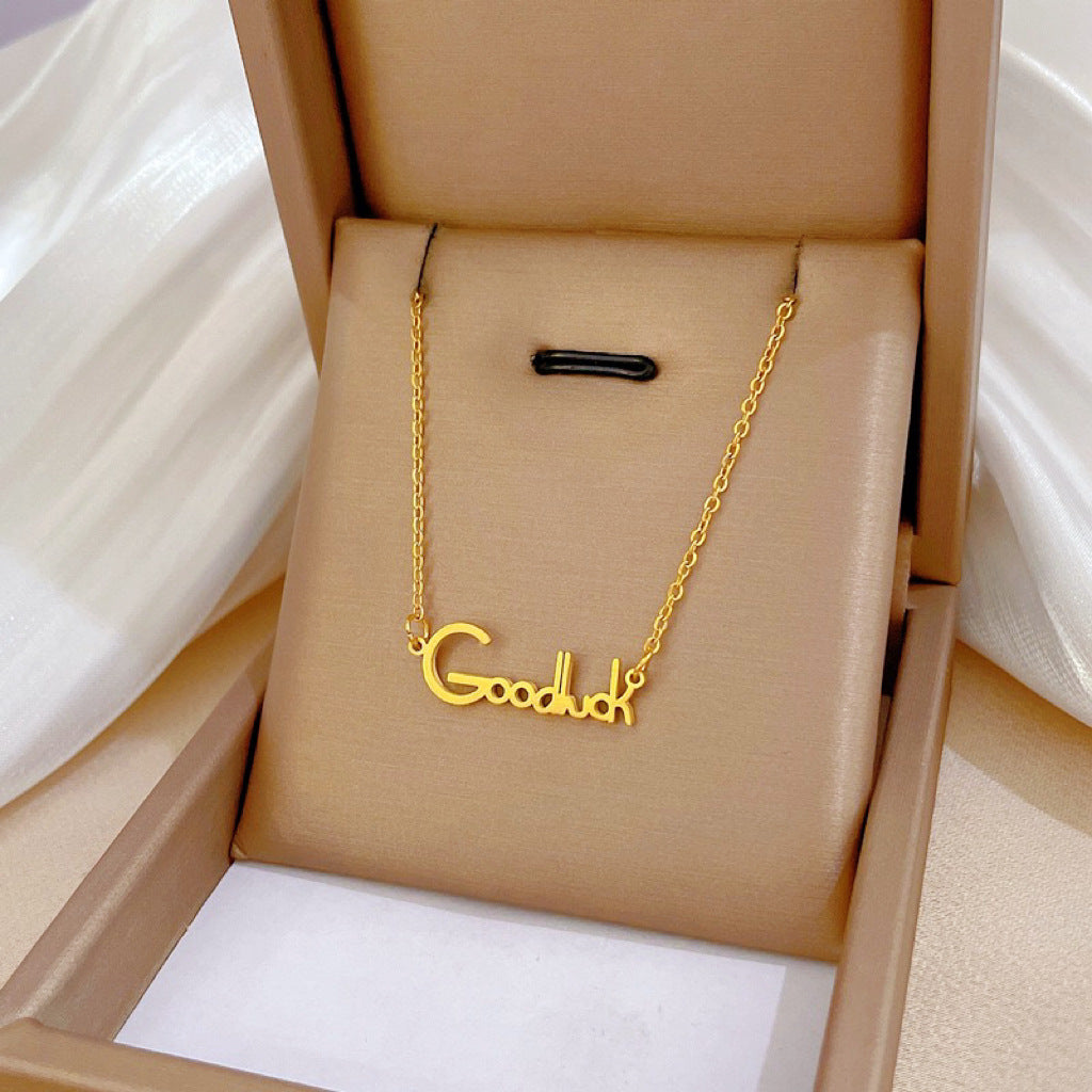 Collana da uomo con catenina corta in acciaio al titanio, placcata in oro 18 carati, con scritta "Good Luck"