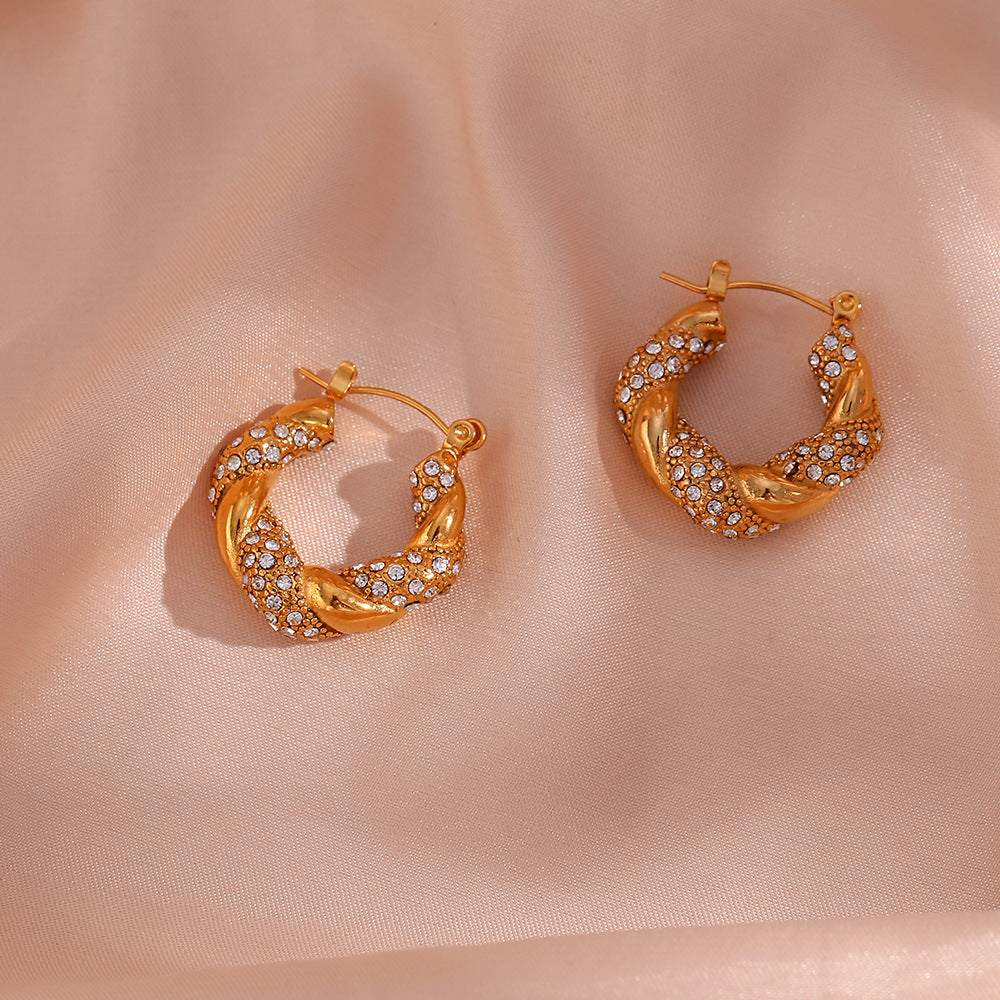 Orecchini a cerchio intrecciati minimalisti di lusso con geometria in acciaio inossidabile placcato oro 18 carati e intarsio in zircone