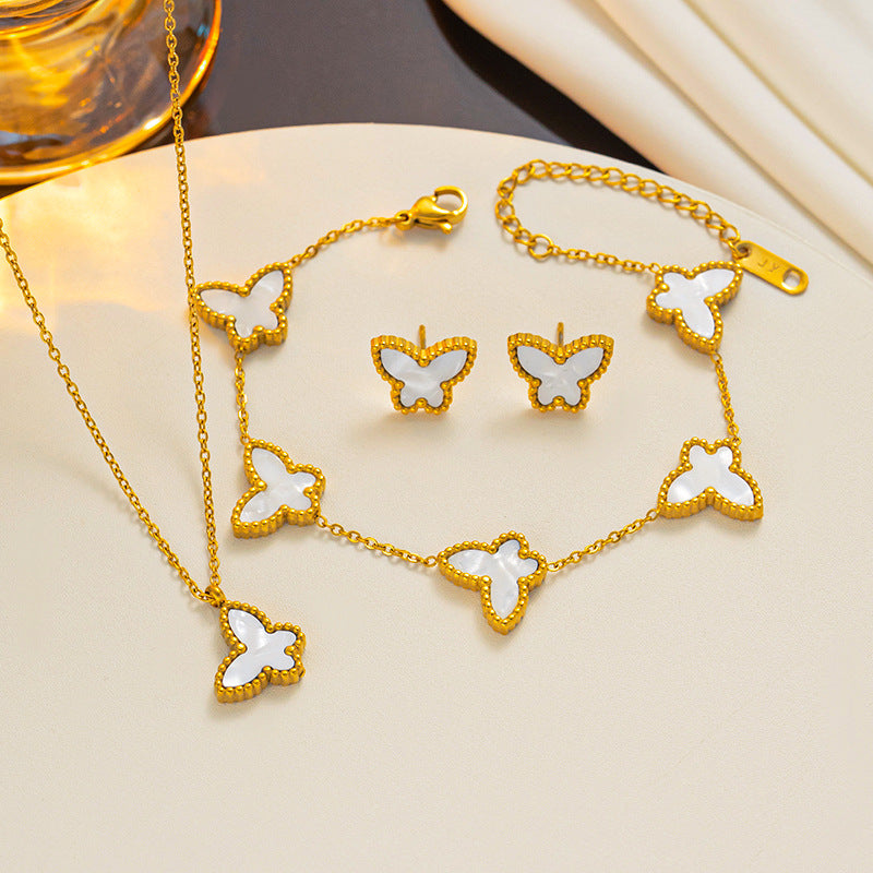 Set di collana, orecchini e bracciale minimalista con farfalla in acciaio al titanio con finitura placcata