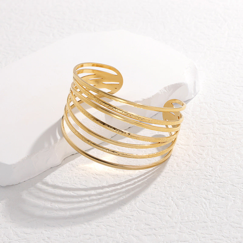Bracciale in Acciaio al Titanio con Finitura Placcata, Linee Geometriche Minimaliste, da Donna