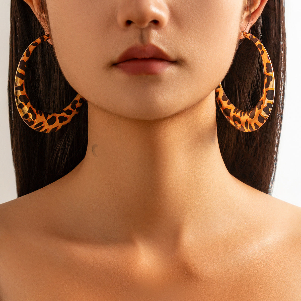 Geometric Metal Hoop Earrings for Women with Plated Finish and Bold Leopard Print Accent