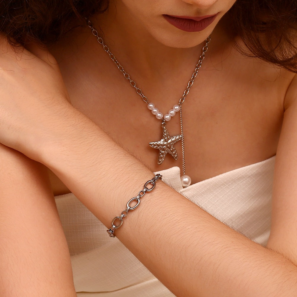 Pulsera de acero inoxidable geométrica minimalista chapada en oro de 14 quilates con forma de O grande para mujer