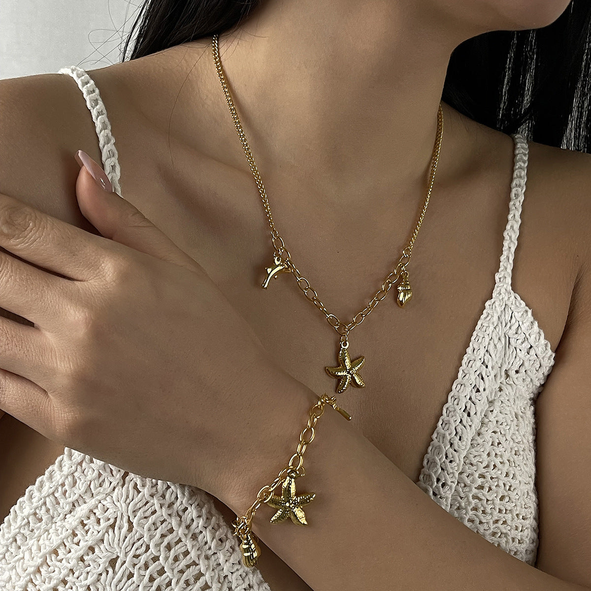 Collana con ciondolo delfino a stella con conchiglia vintage da donna, catena in lega con finitura placcata, gioielli a tema oceano