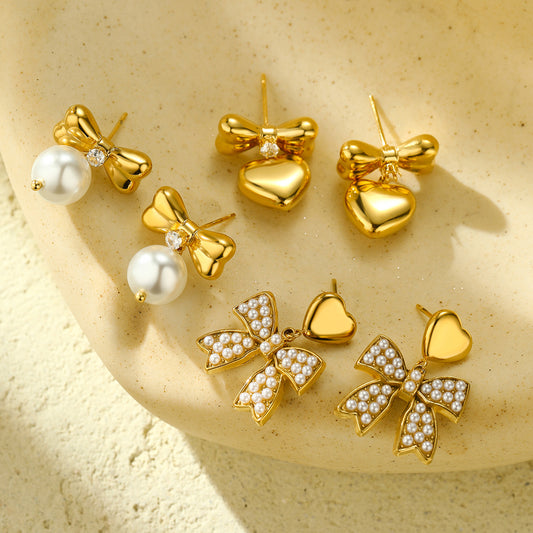 Pendientes elegantes de acero de titanio con lazo para mujer con detalles de pedrería, aretes de acero inoxidable en forma de corazón, minimalistas y versátiles