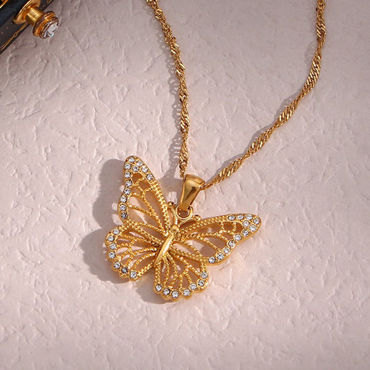 Collar minimalista con colgante de mariposa para mujer, de acero inoxidable, hueco, con circonitas, cadena ondulada