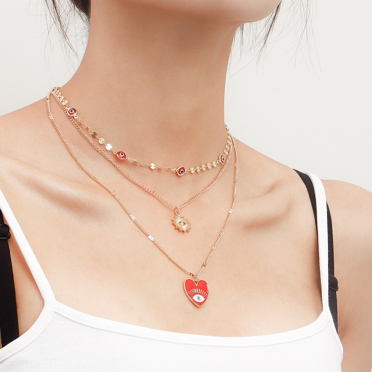 Minimalist Geometric Evil Eye Pendant Necklace for Women with Alloy Body and Gold Plating, Multi-Layer Clavicle Chain Design